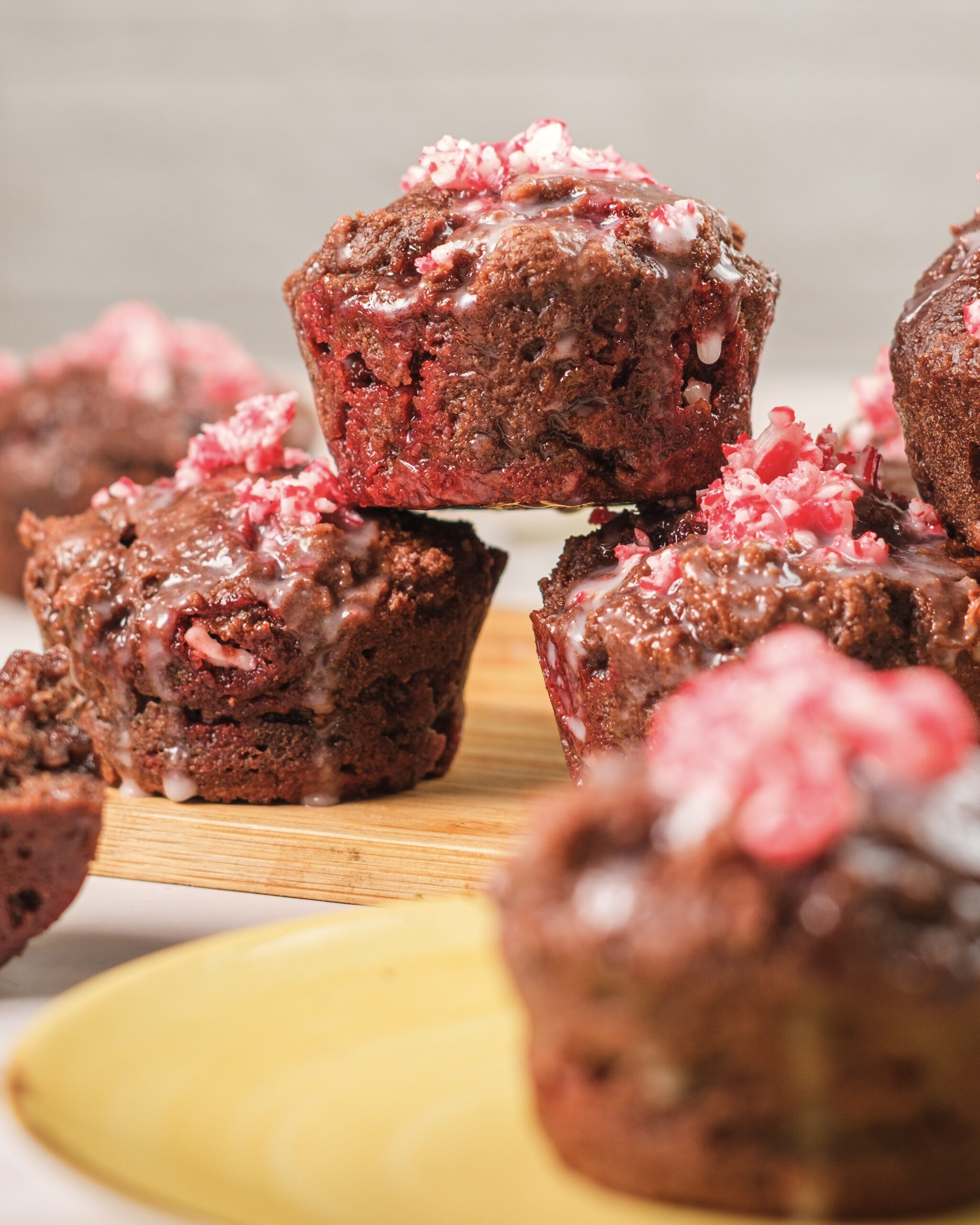 Peppermint cottage cheese muffins with crushed peppermint pieces on top and a soft, fluffy texture.
