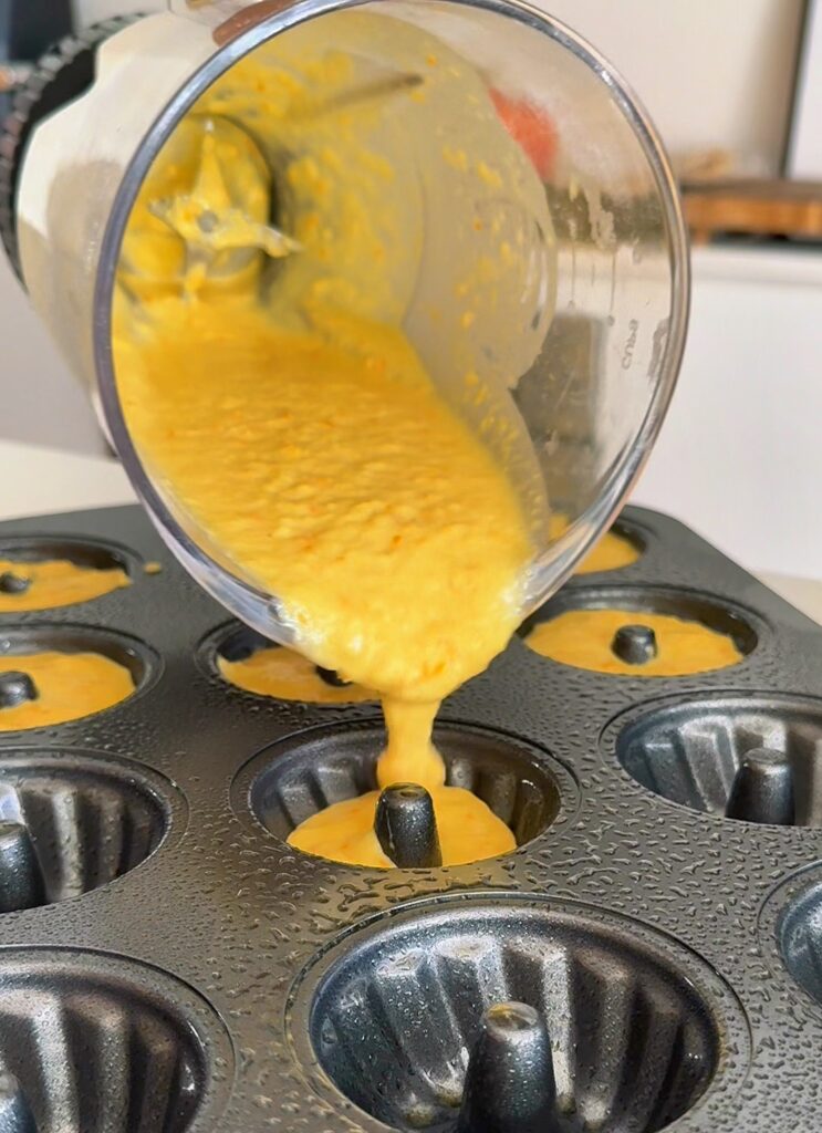 Pouring blender cake mix