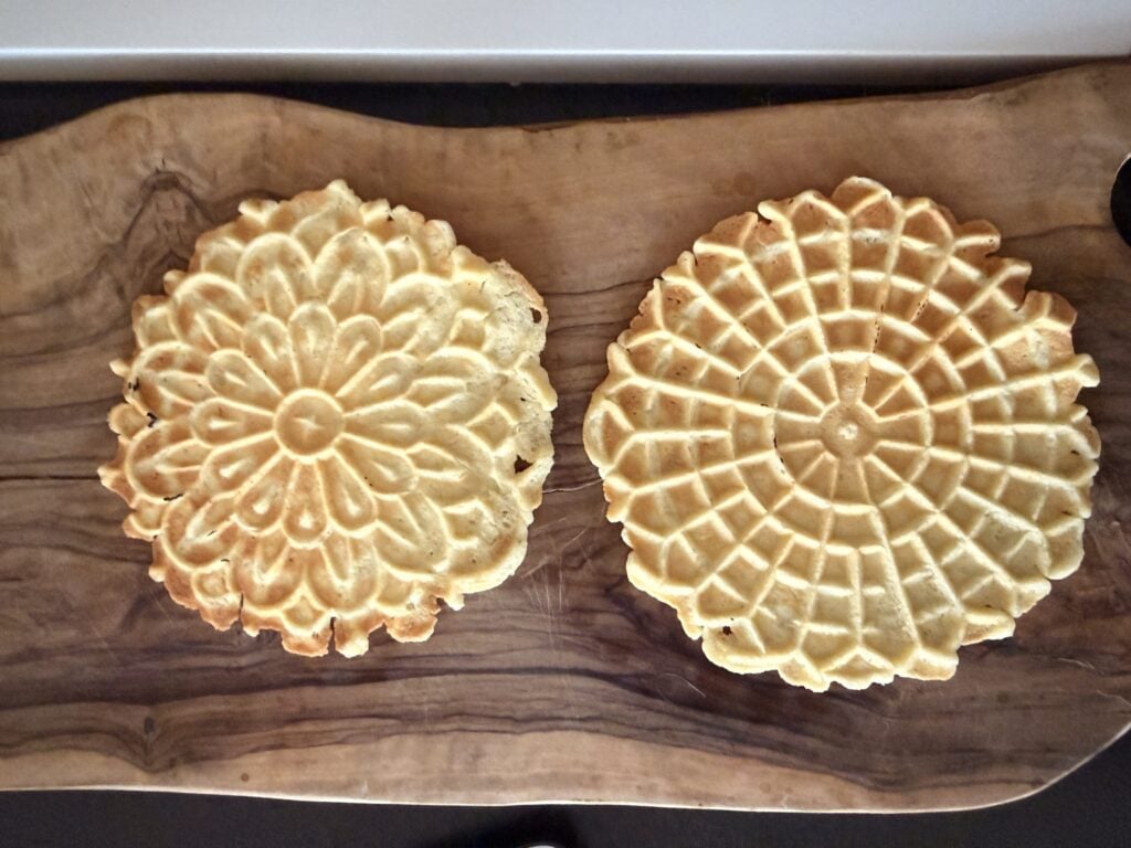 High protein pizzelle cookies on wooden board