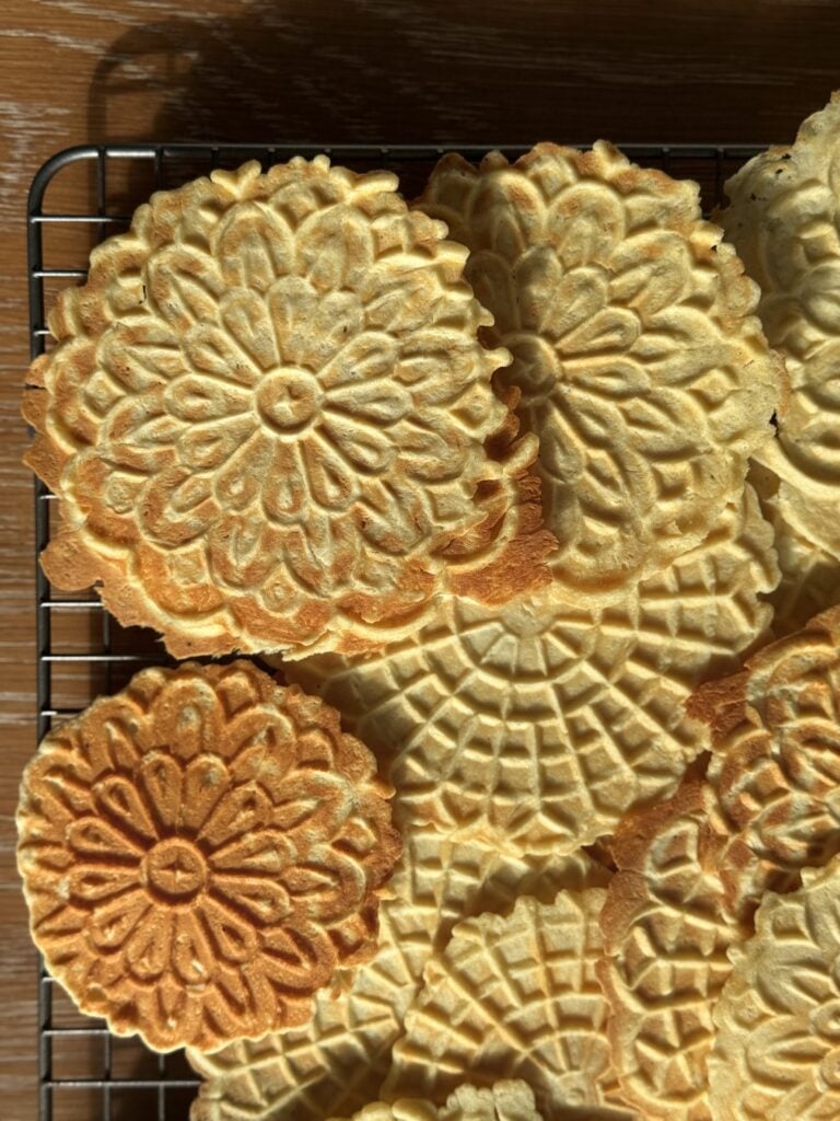 Stacked high protein pizzelle cookies