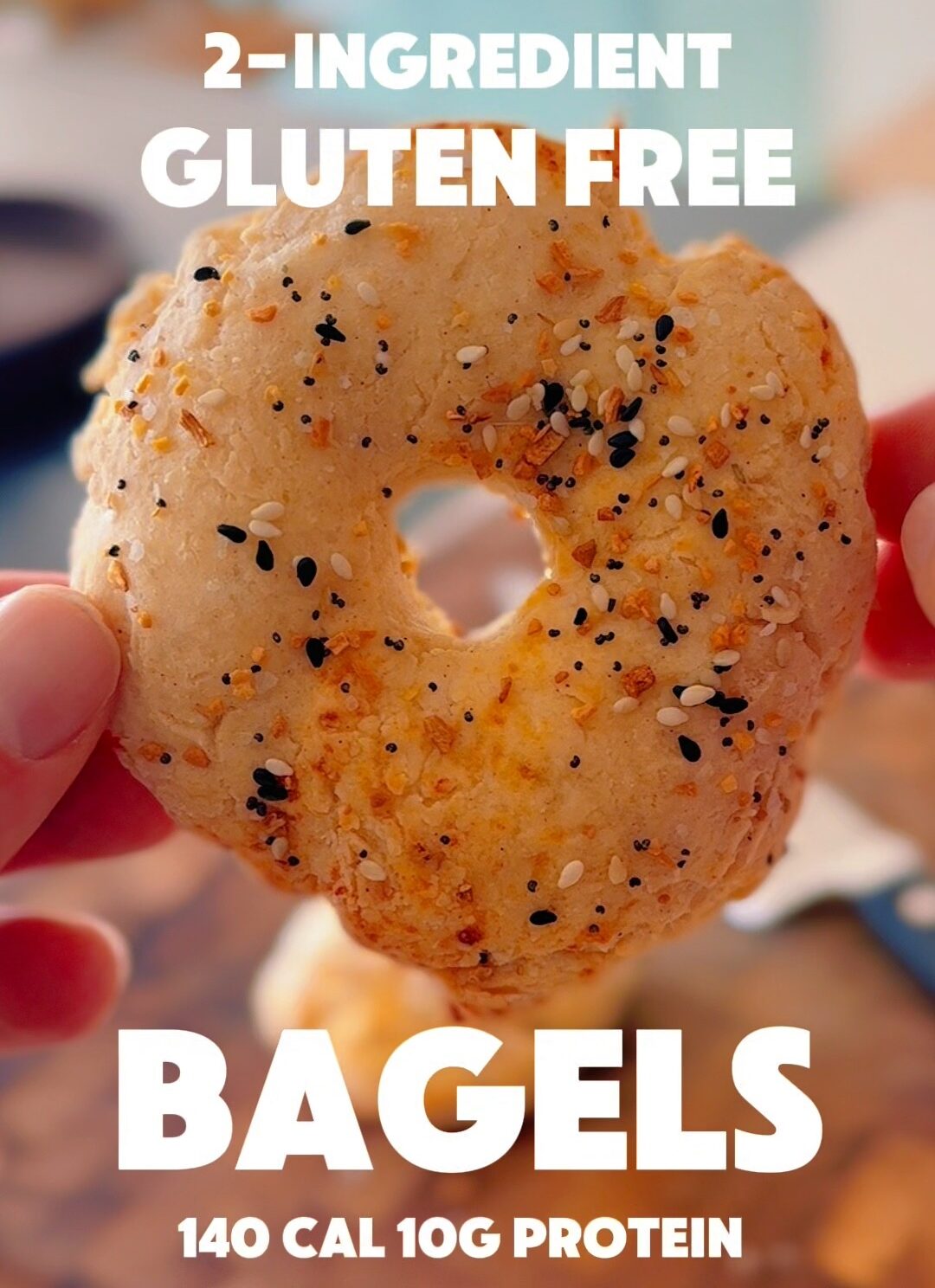 Gluten-free cottage cheese bagel held up close showing crust and seasoning