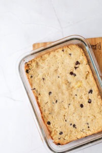 Gluten-free protein blondie batter spread in baking dish