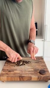 Chopped Oreo cookies for an Oreo cheesecake protein bowl