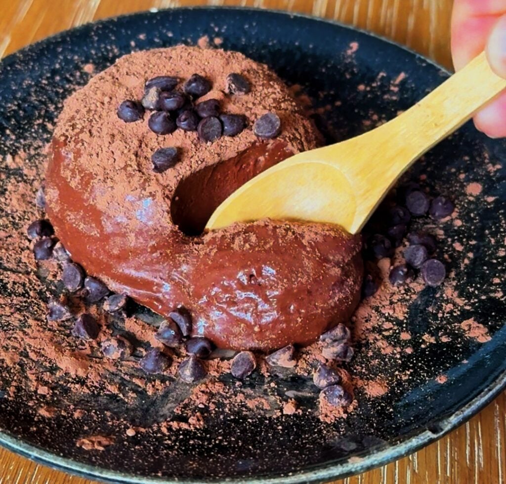 spoon cutting into chocolate cottage cheese semifreddo