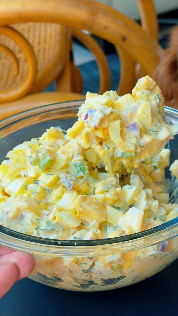 Close up of creamy high protein egg salad in a bowl