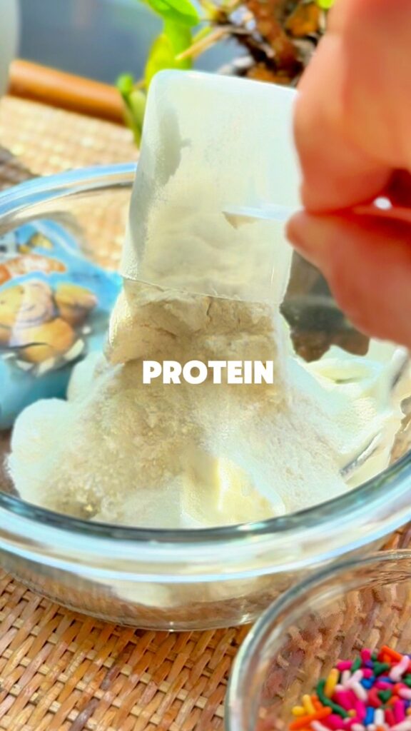 Adding Sprinkles and Protein Powder to Dunkaroo Dip