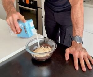 Adding ingredients to bowl for low calorie Nutella-style chocolate spread