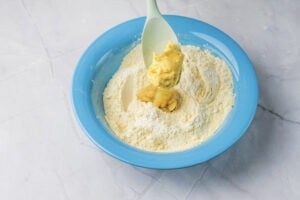 Adding Wet Ingredients to Cornbread Dough