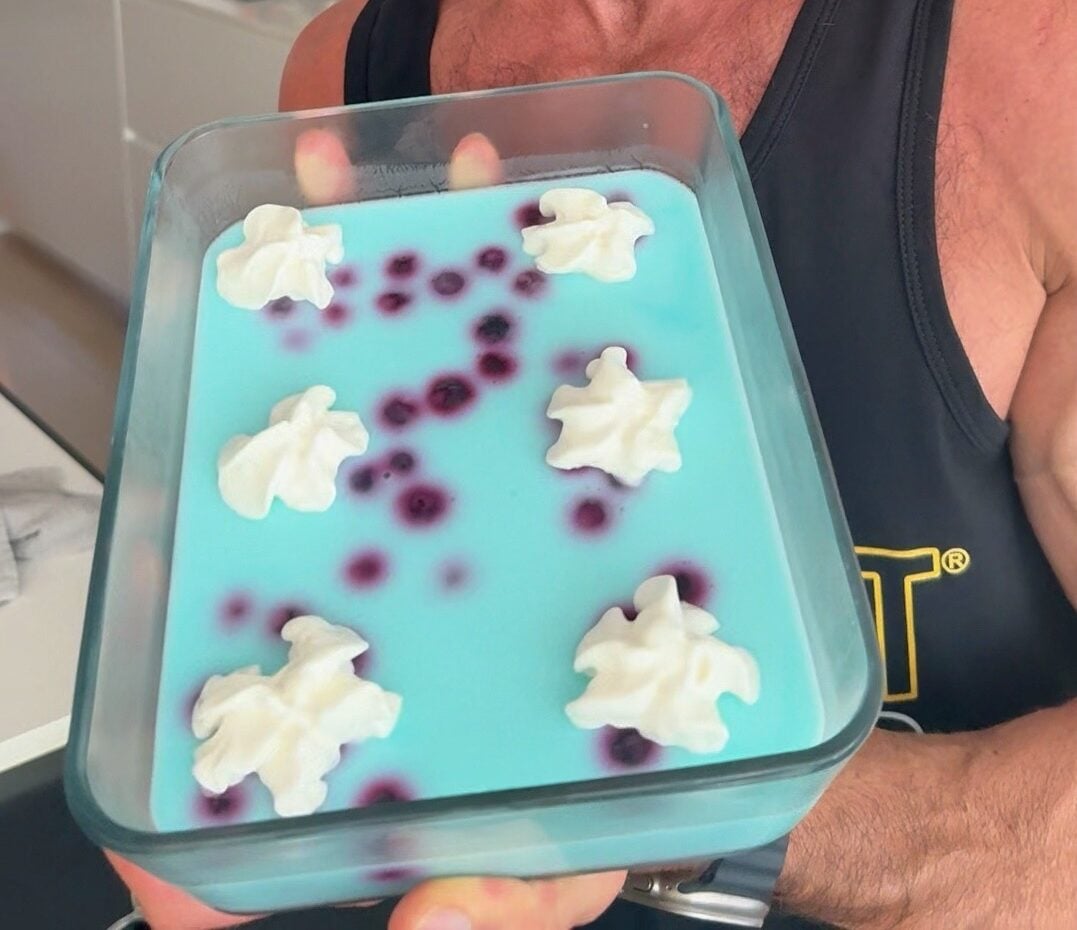 High-protein blue raspberry fluff in glass dish