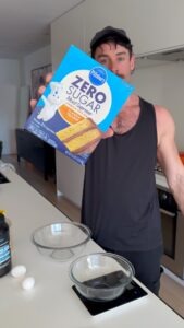Adding dry ingredients to protein snickerdoodle muffin batter
