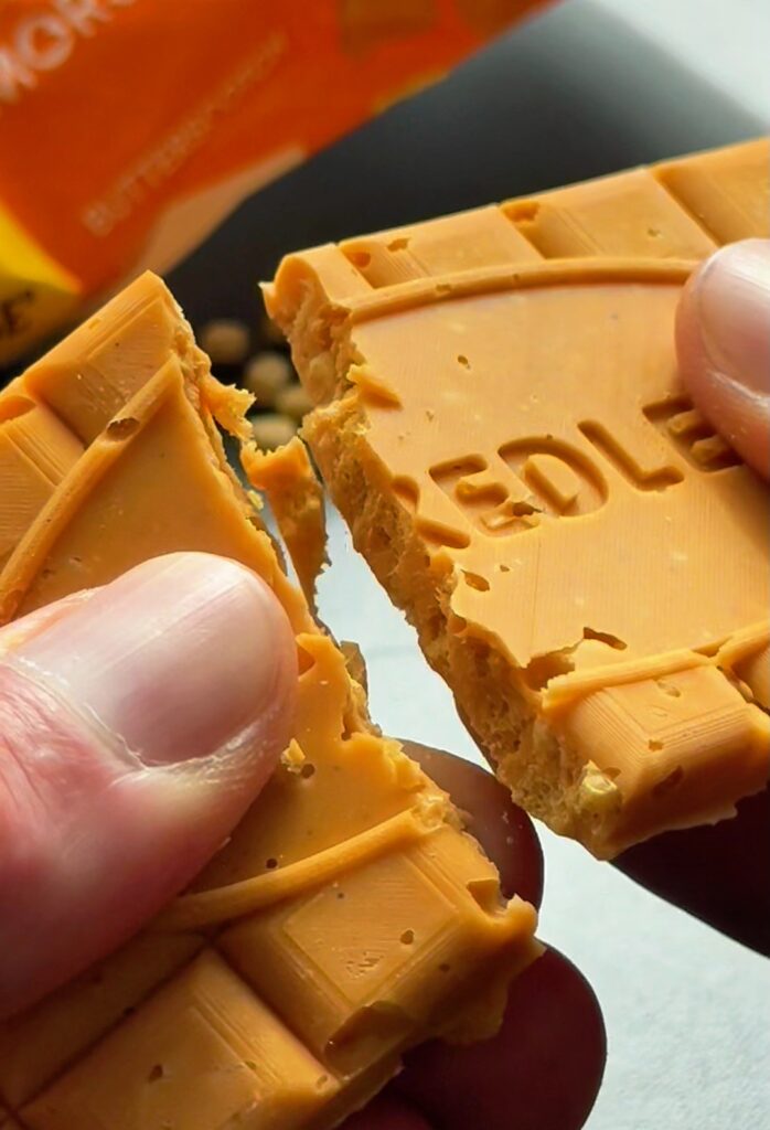 crunch of a a Butterscotch High Protein Chocolate Bar