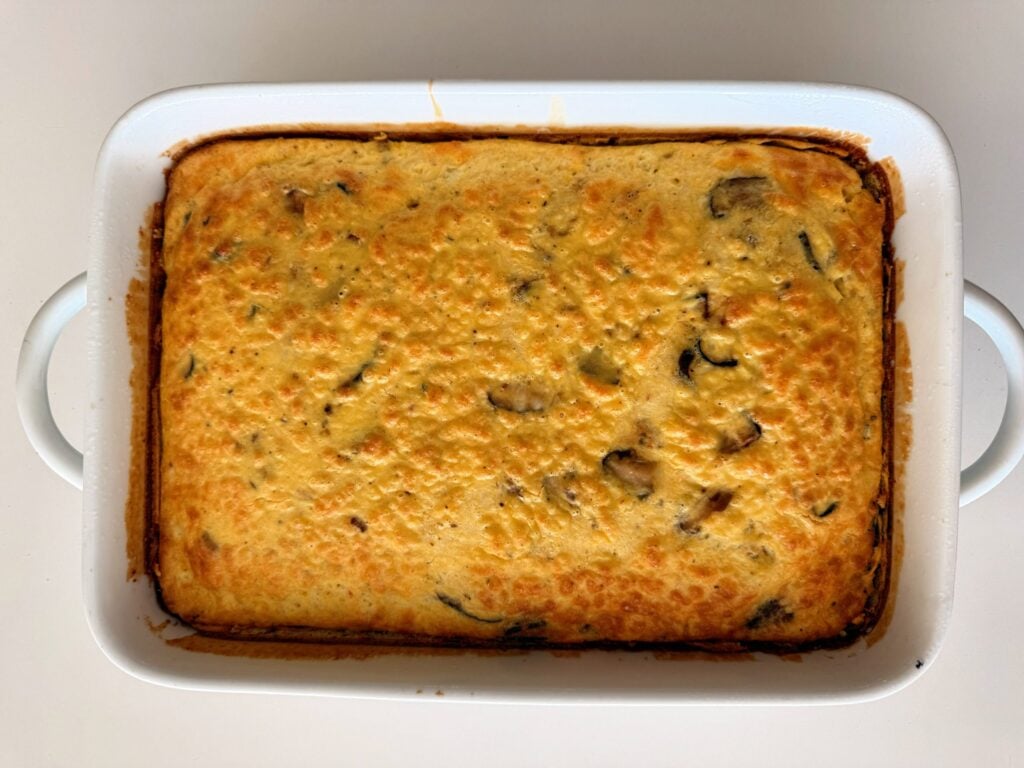 High protein cheese egg casserole baked in a casserole dish