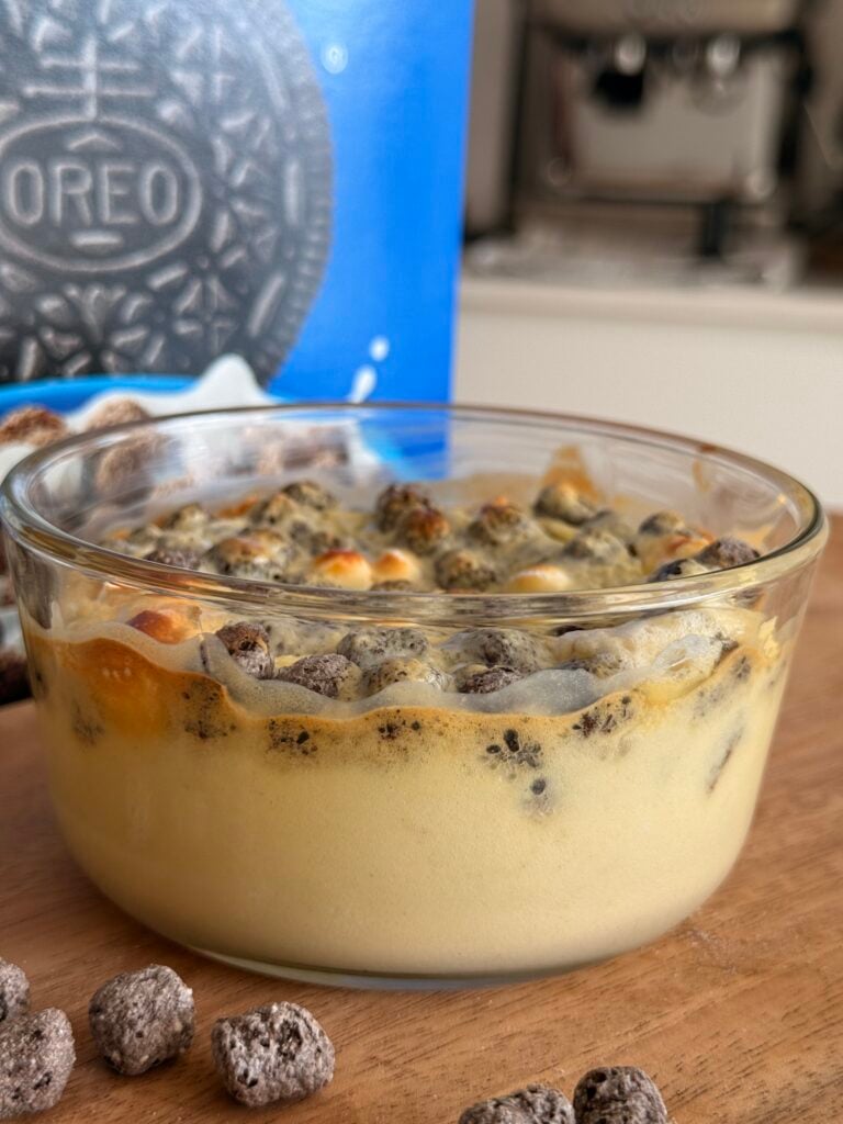Finished Cheesecake with Oreo Puffs Box in Background