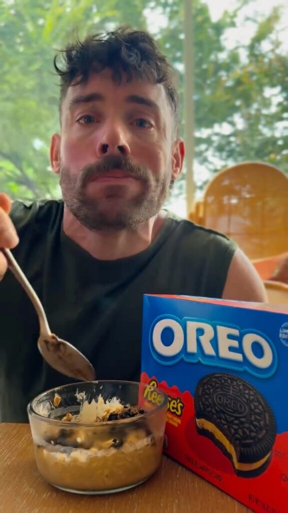 Jacob eating Reese's and Oreo Overnight Oats Finished