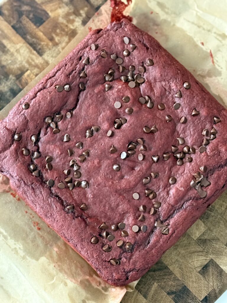 whole close up of red velvet protein brownie
