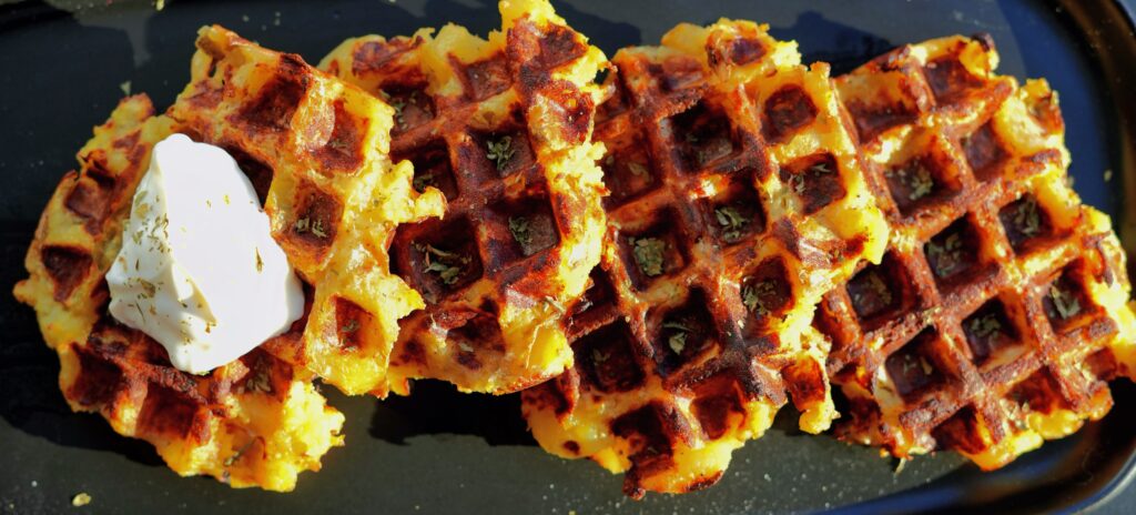 Crispy golden brown potato waffle close up