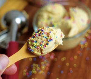 High protein cookie dough layered in a glass.