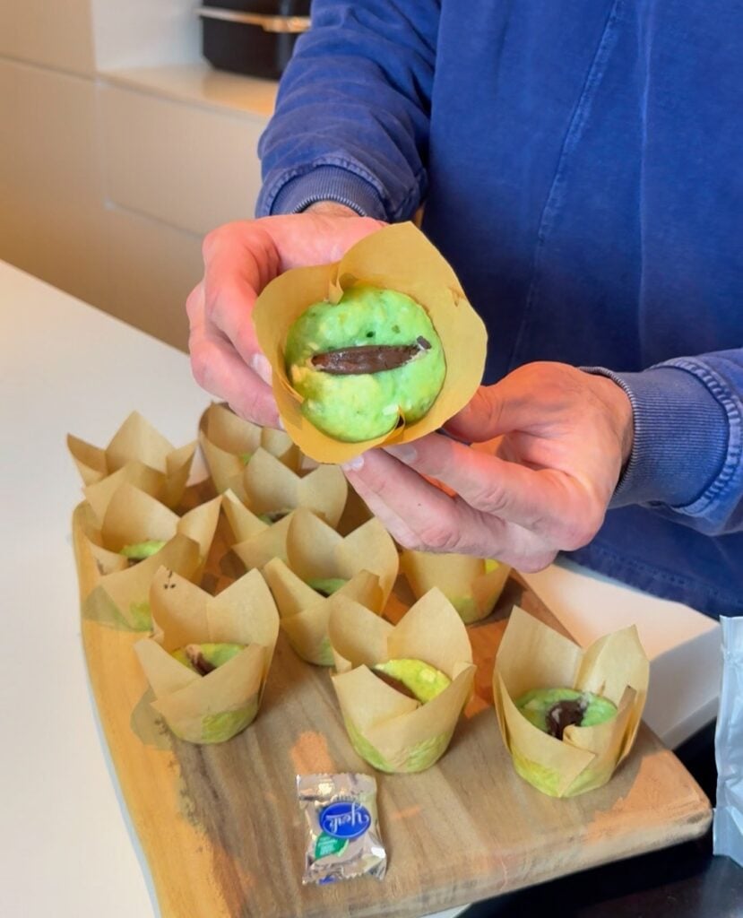 Jacob holding a York Peppermint Muffins whole