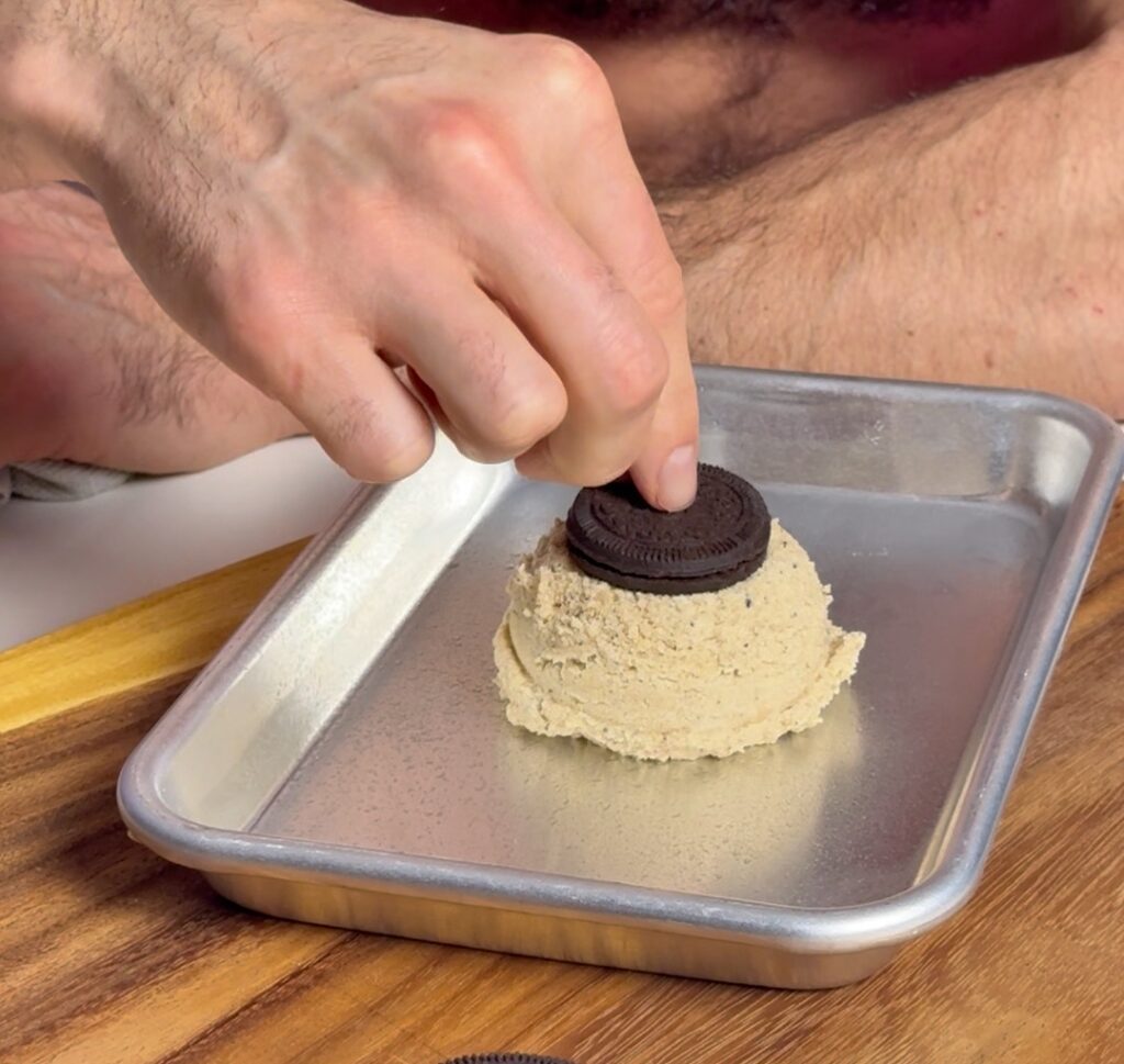 putting cookie on top of protein cookie