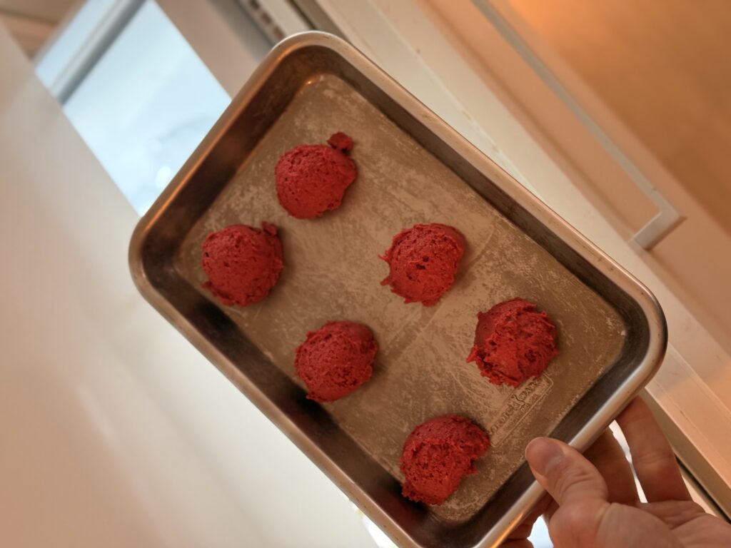 rolled crinkle cookies going to freezer