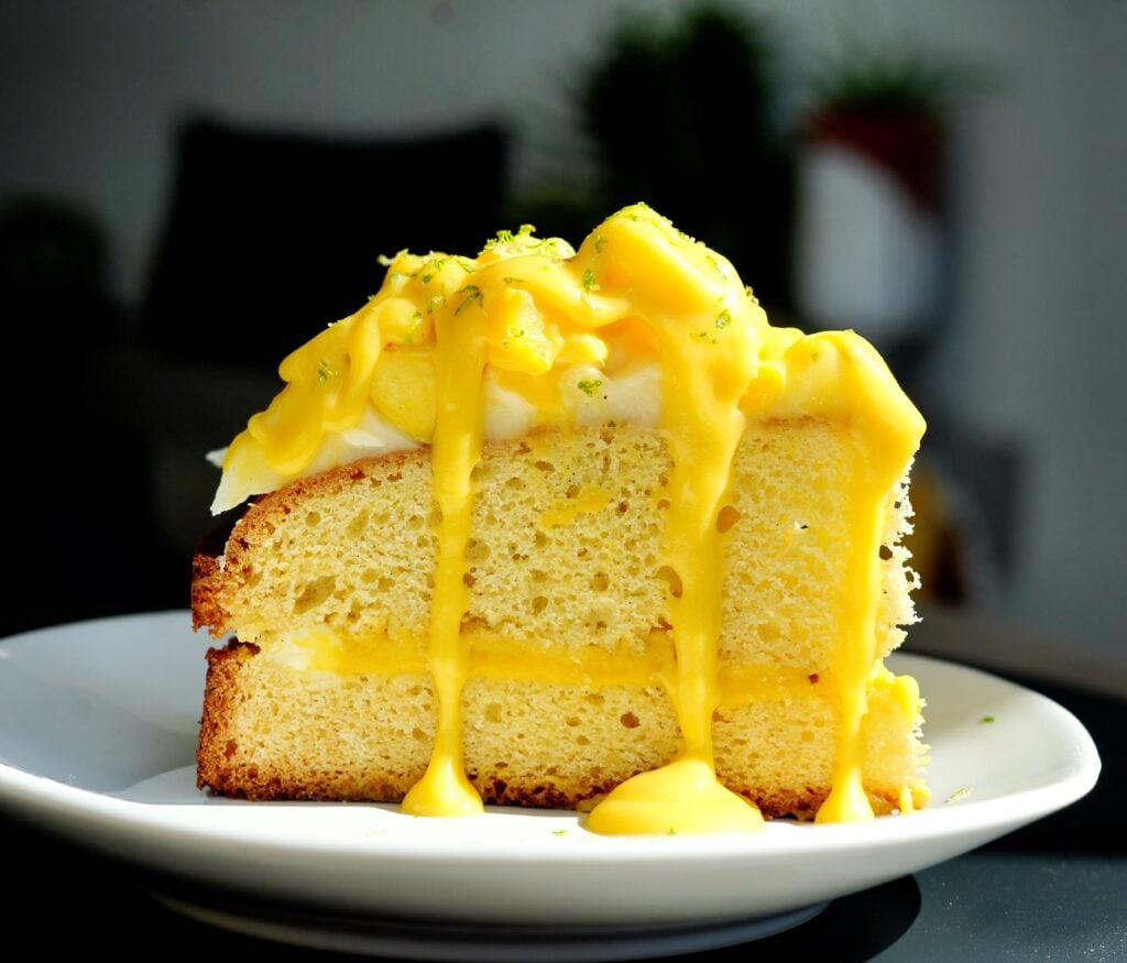 Sliced mango cake shot close up