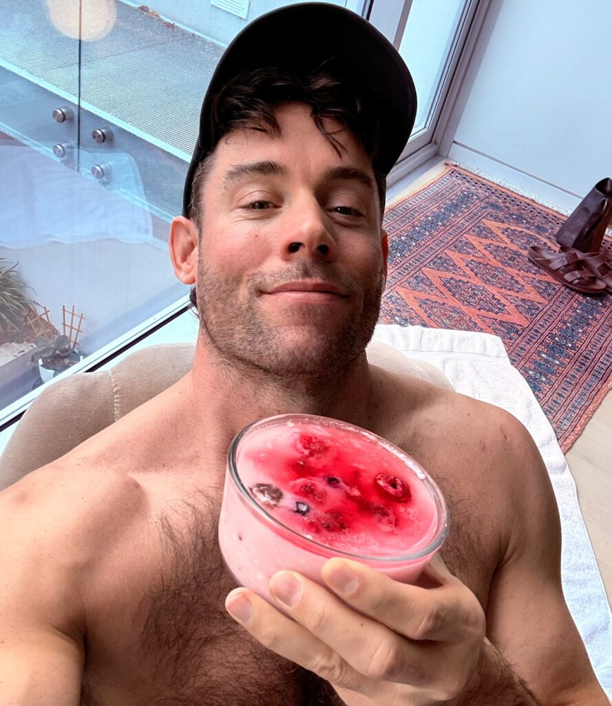 Jacob holding Strawberry Protein Fluffy Yogurt