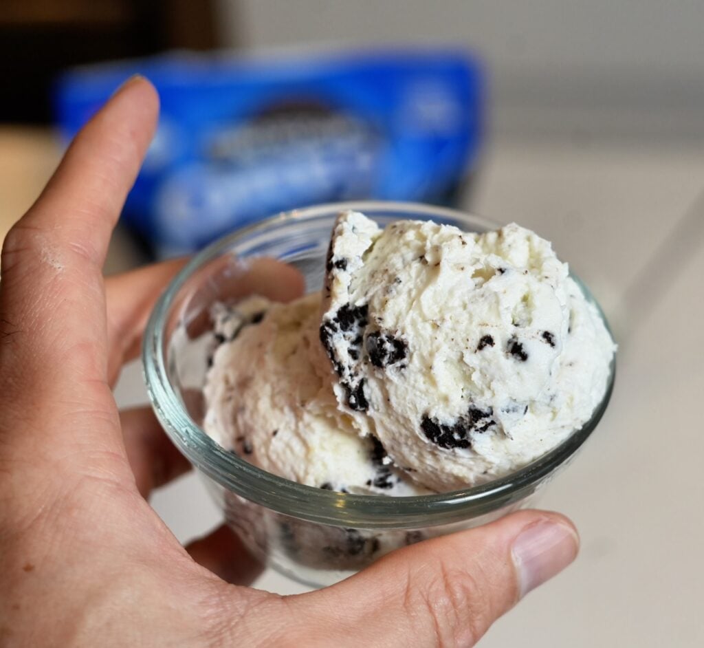 Fluffy Oreo Yogurt Scooped in Hand