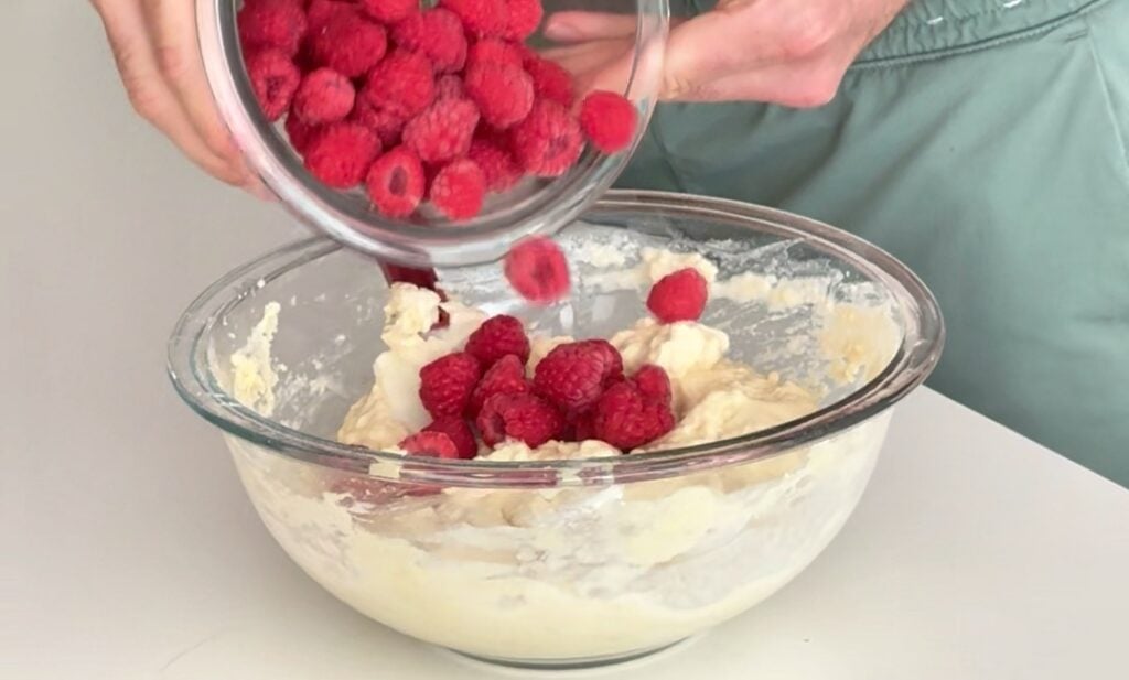 folding berries into batter