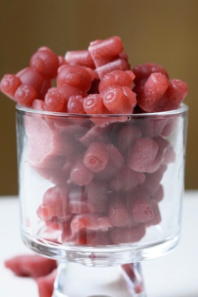 glass full of apple cider vinegar gummies