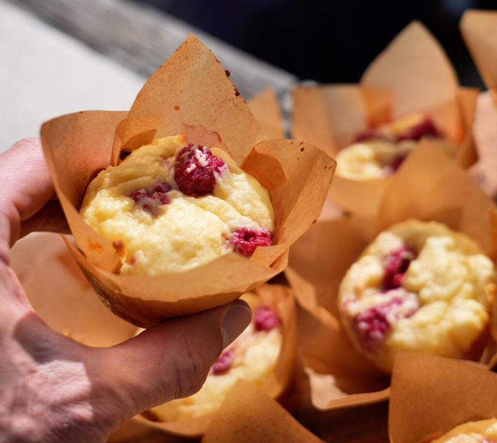 jacob holding the raspberry protein muffin