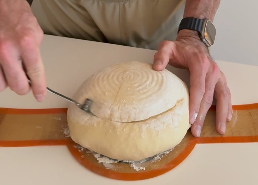 scoring orange sourdough
