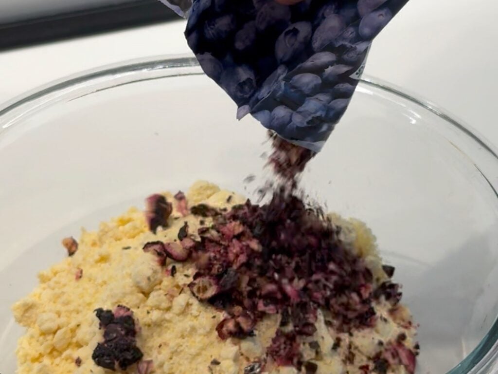 Adding blueberries to flour