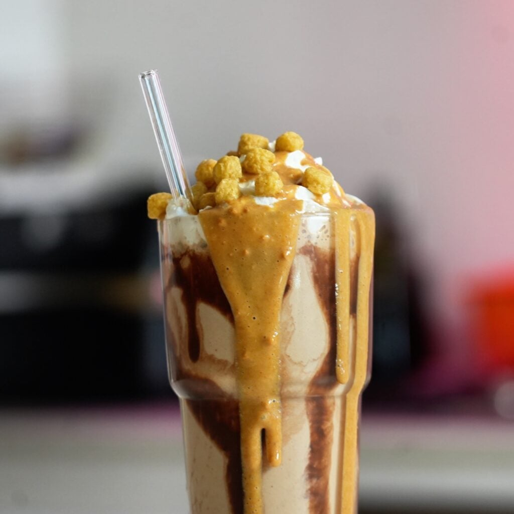 close up chocolate peanut butter protein shake