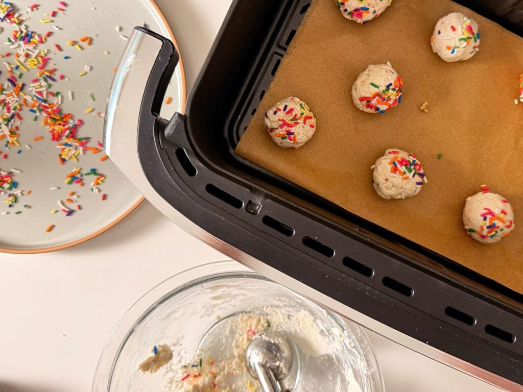 funfetti birthday cake donut holes rolled in station