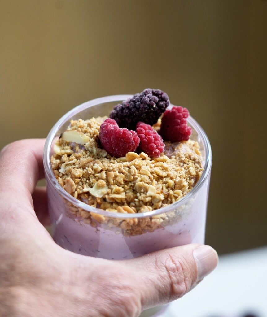High Protein No Bake Berry Cheesecake with Cottage Cheese in Hand
