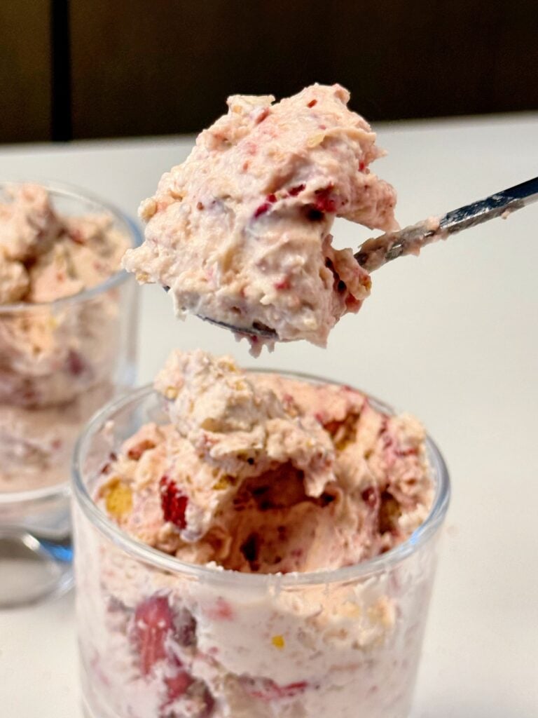 strawberry fluffy yogurt on spoon