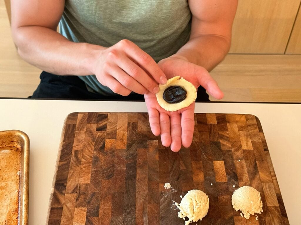 shaping the coconut surprise cookies