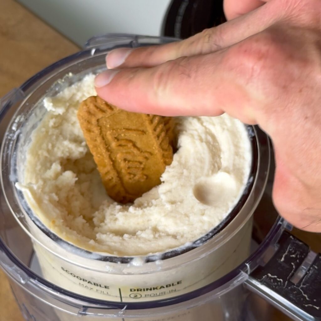 adding cookies to mixing container