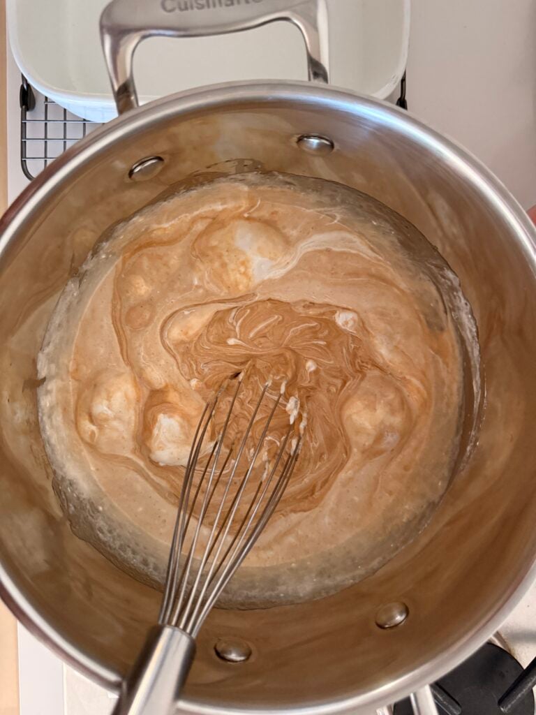 adding peanut butter and fluff to fudge