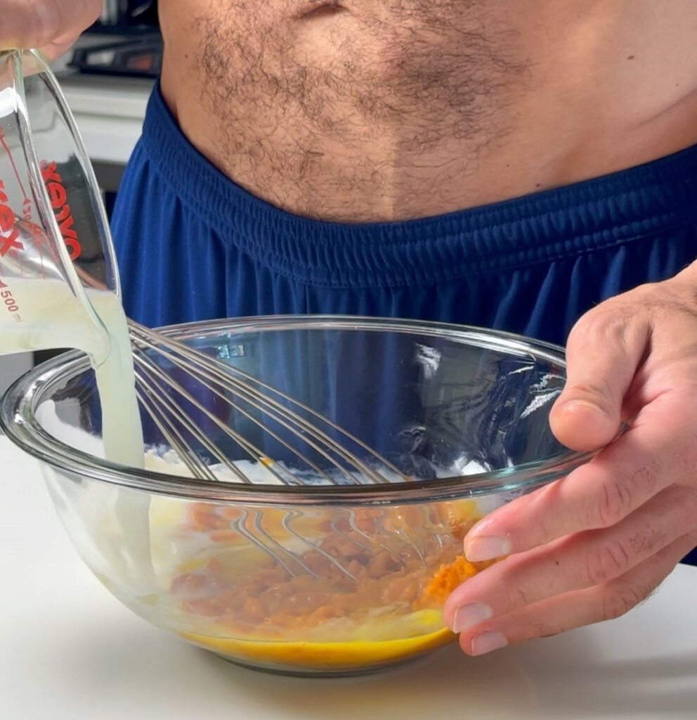 adding wet ingredients for the waffles