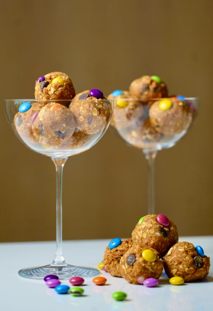 cookie dough balls in coup glasses