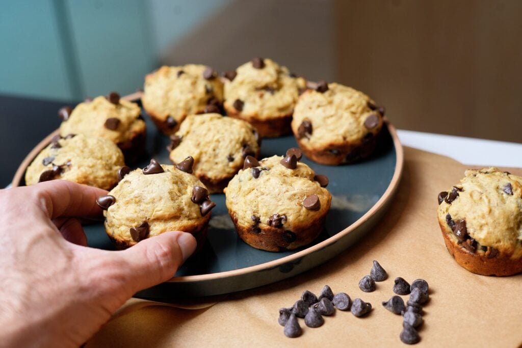 high protein banana bread muffin on plate