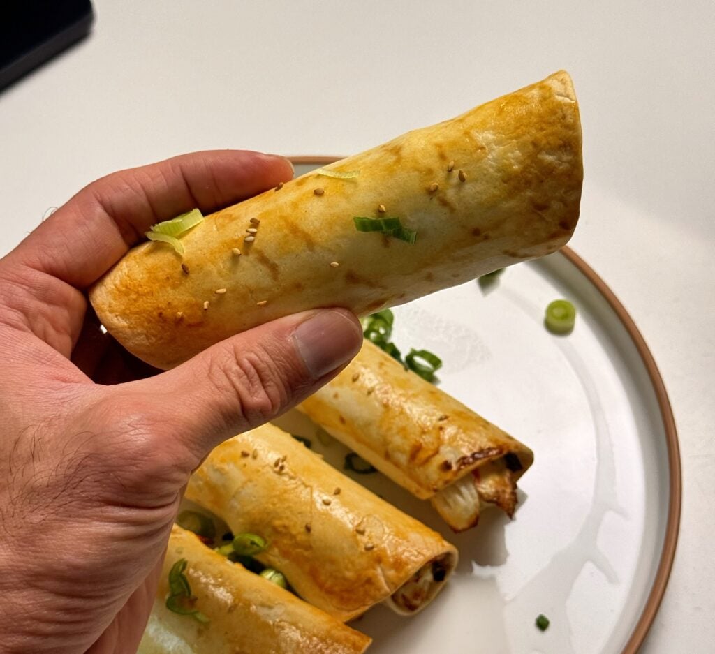 high protein low carb crab rangoons in hand