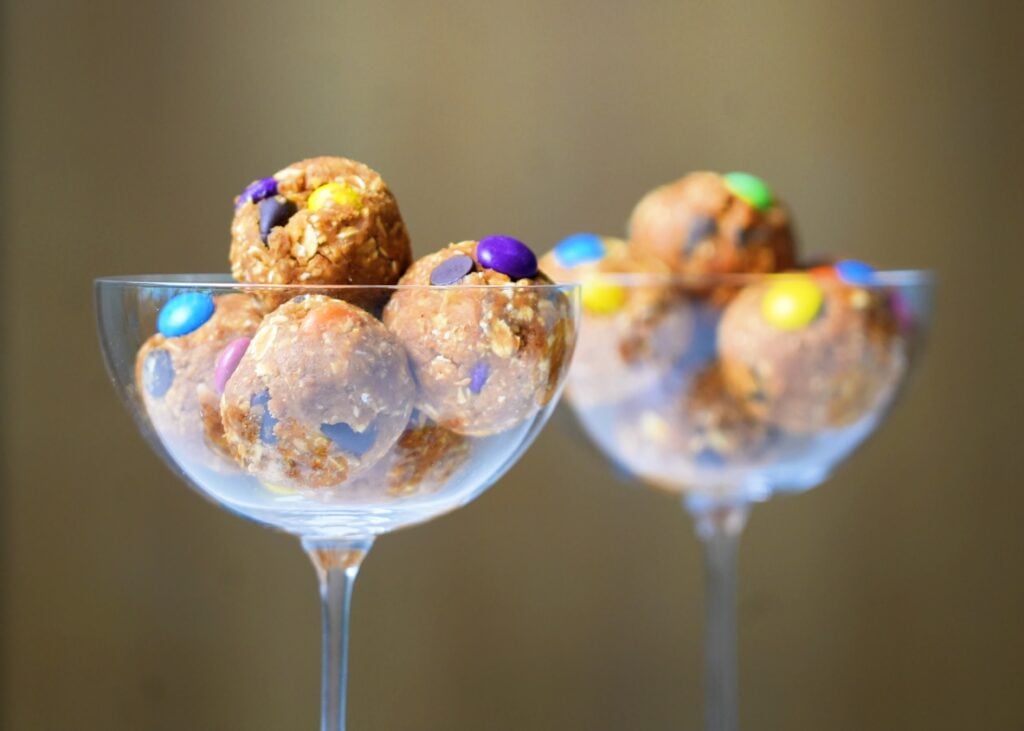 high protein monster cookie balls in glasses