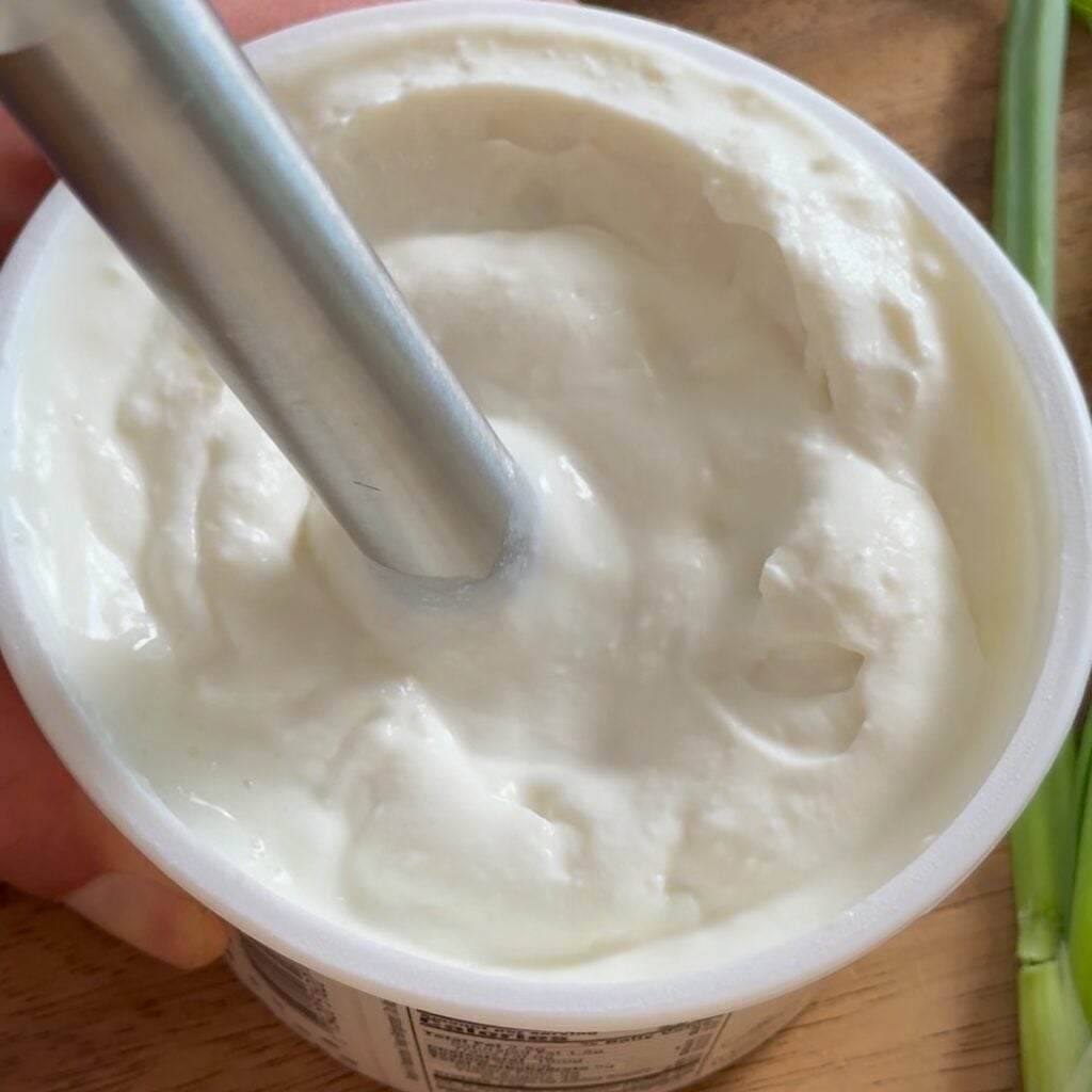 high protein pickle cottage cheese dip ingredients in cottage cheese container whipped