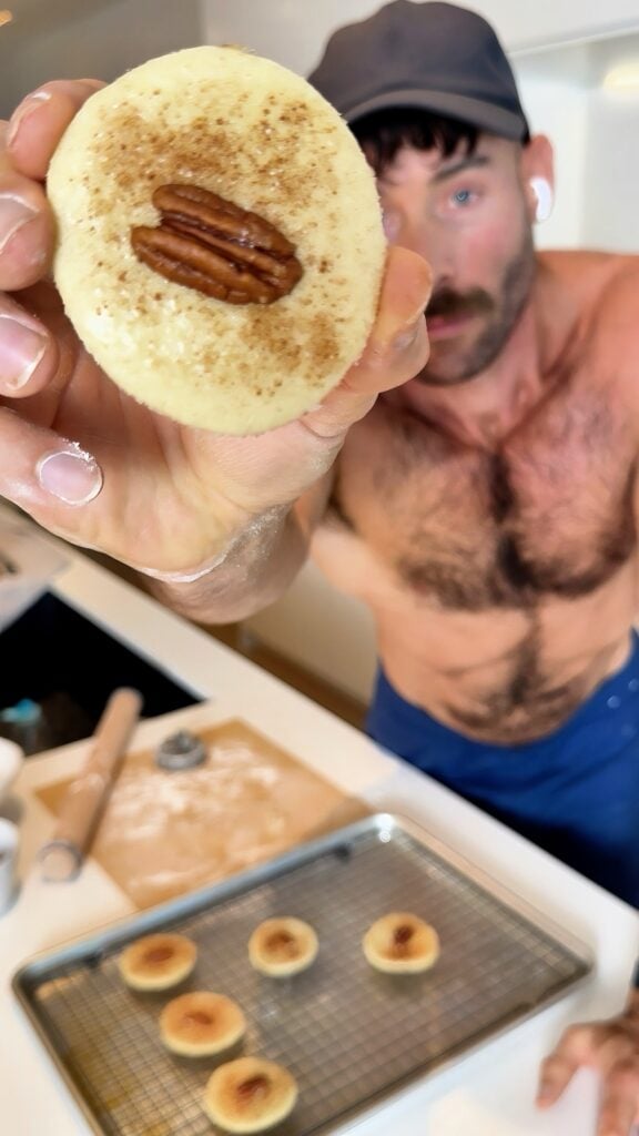 jacob holding a finished sand tart