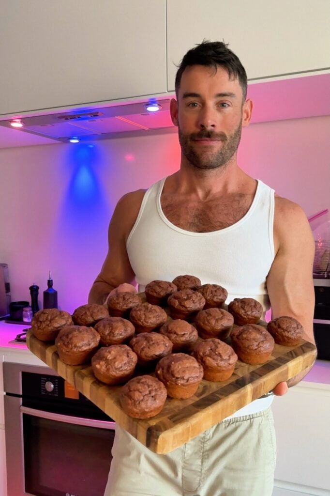 jacob holding his chocolate protein muffins in basket