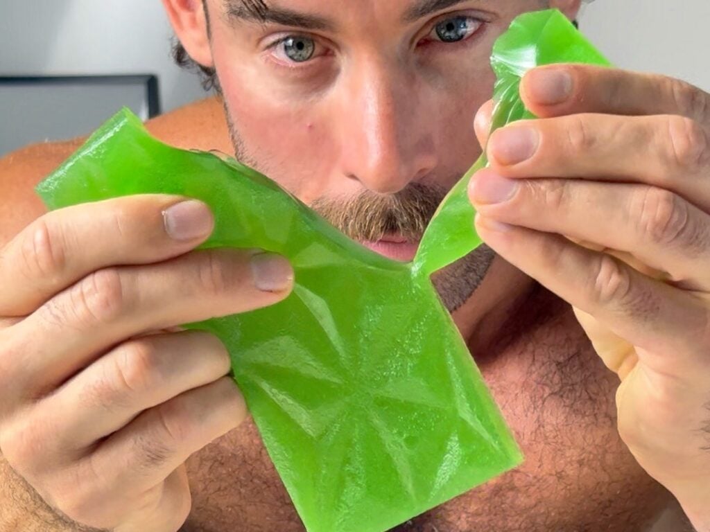 jacob peeling the gummy protein bar