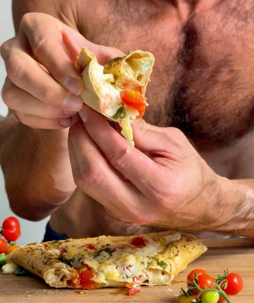 jacob showing his portion stuffed crust italian omelet