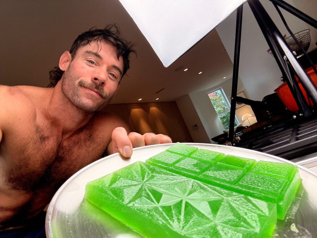 jacob showing off his gummy protein bar